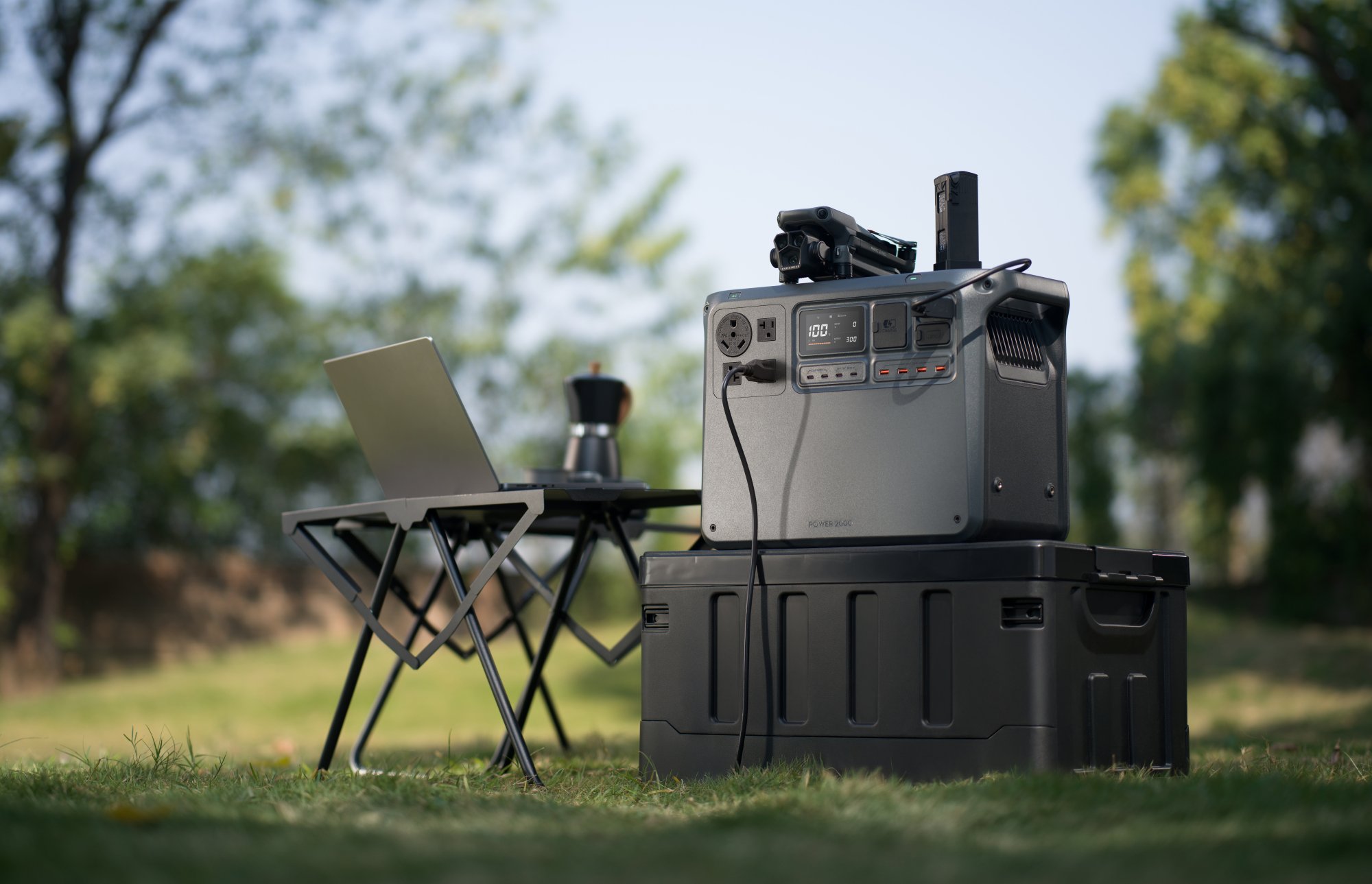 the DJI power 2000 out camping and recharging a DJI drone