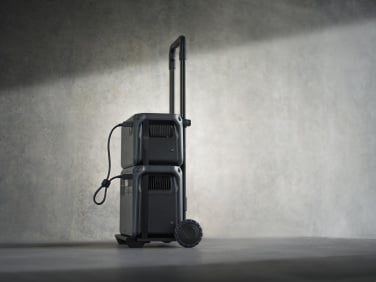 the DJI power 2000 with expansion battery on a hand truck