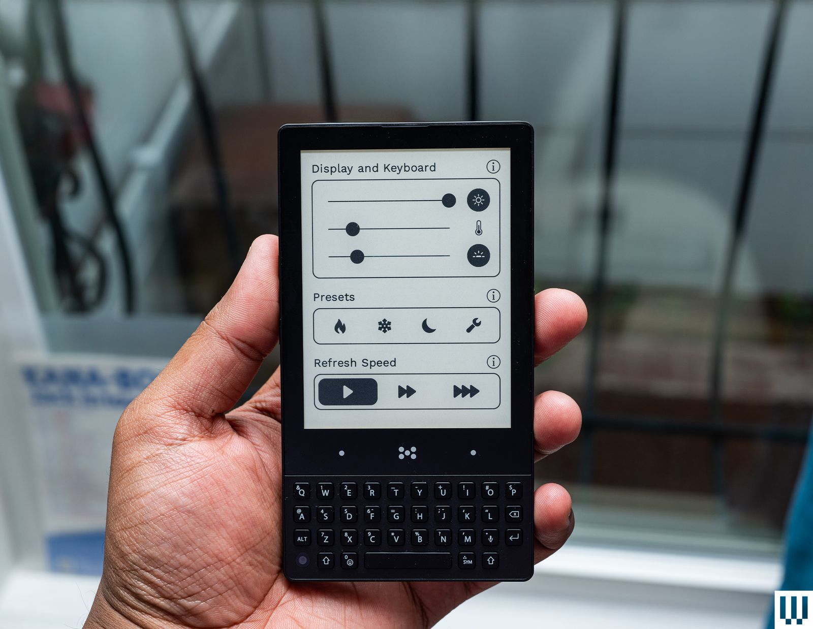 Image may contain Electronics Mobile Phone Phone Baby and Person